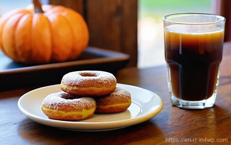 각 지역의 특산 음식으로 태어난 카페 메뉴 - **New England Autumn Cafe Scene:** A cozy, rustic cafe interior bathed in warm, golden afternoon lig...